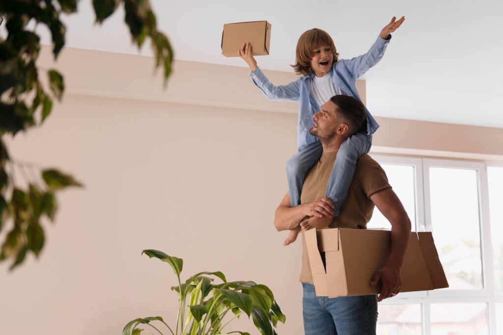 father-moving-new-house-with-his-child